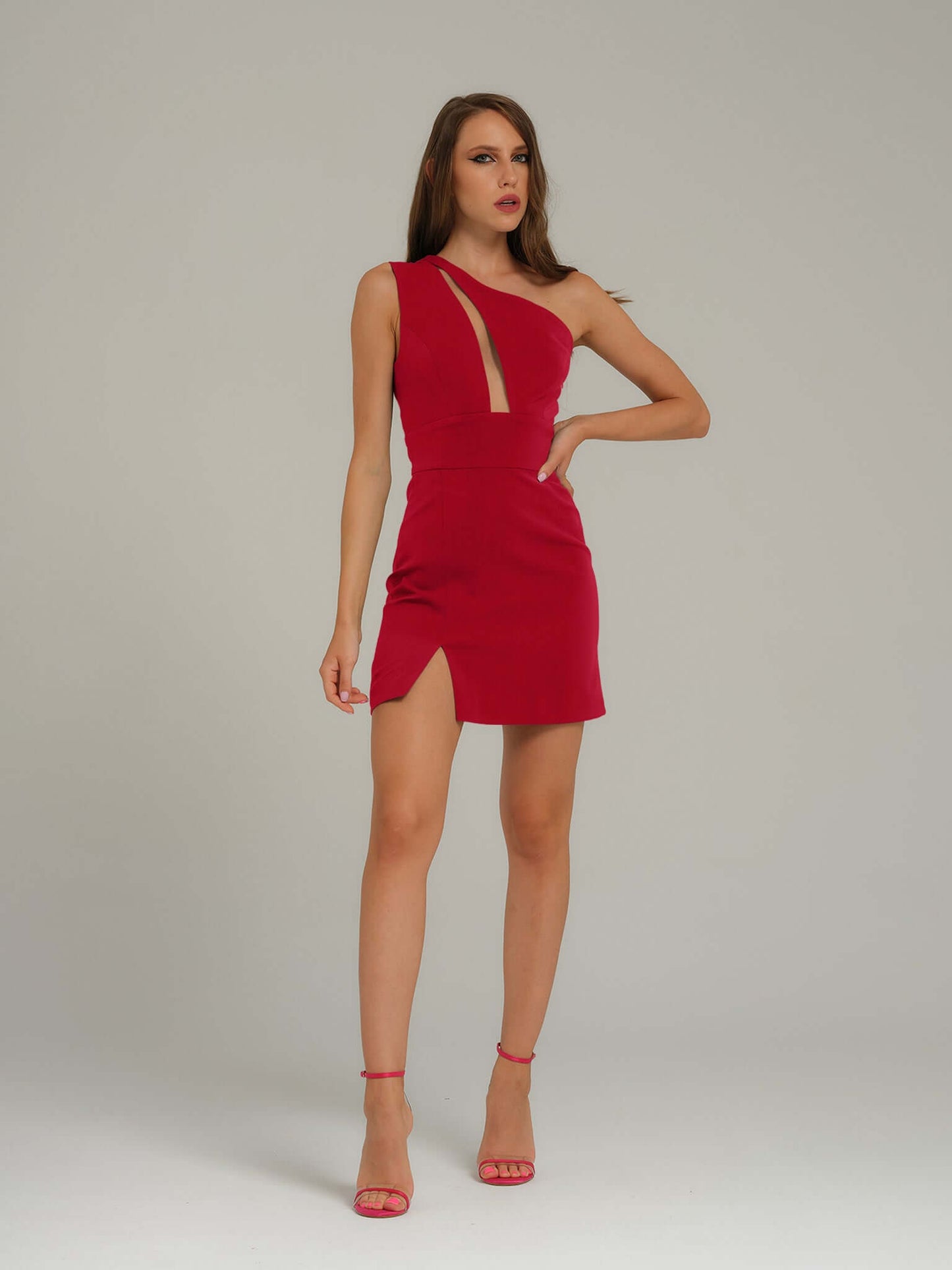 Tia Dorraine Love Weapon One-Shoulder Mini Dress - Red This mini dress showcases the sophisticated style and modern allure of Tia Dorraine. Its confidently feminine figure-hugging silhouette pairs with an asymmetrical neckline and cut-out bodice details f