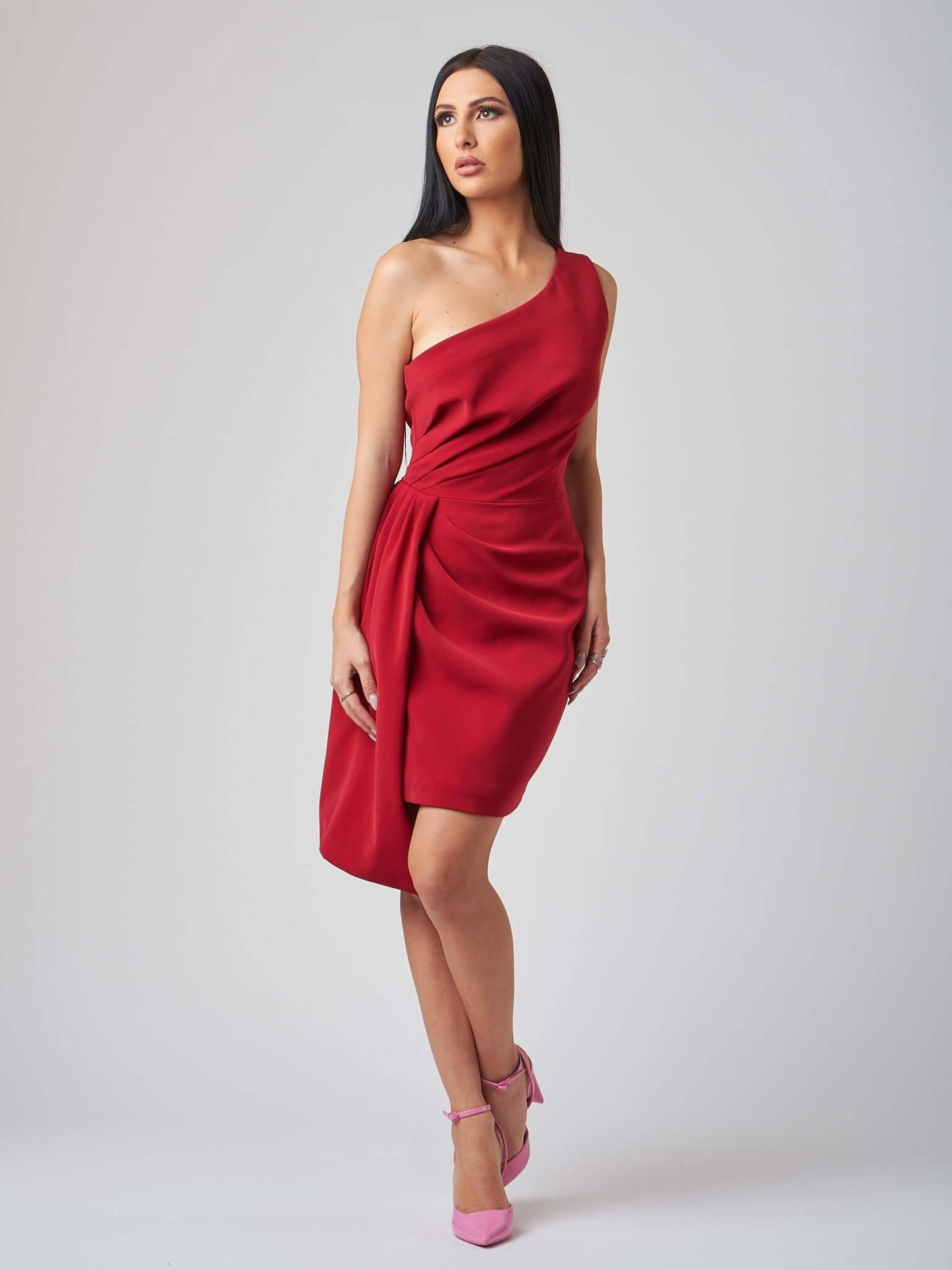 Tia Dorraine Iconic Glamour Draped Short Dress - Fierce Red Tia Dorraine’s artful creations such as this dress are made to be reserved for important moments. Crafted from stretch crepe, this dress channels old Hollywood glam through its draped core and as