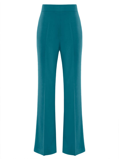 Tia Dorraine Magic Hour High-Waist Flared Trousers These classic flared trousers would fit perfectly in any woman’s capsule wardrobe. With their full length, they can be worn with heeled boots or high heels in the office. The trousers feature a classic wa