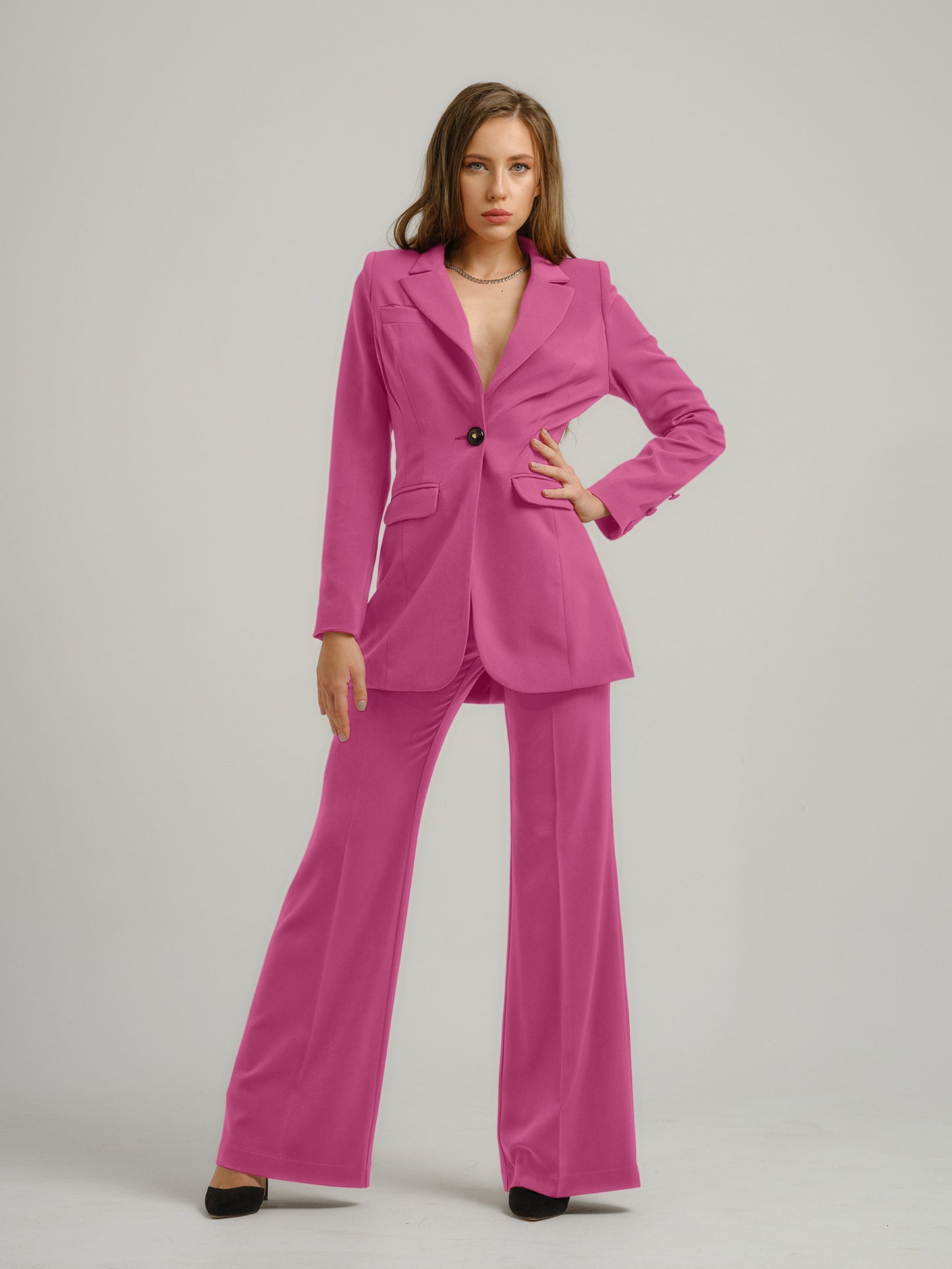 Tia Dorraine Sweet Desire Timeless Classic Blazer The thigh-length blazer is one of our favourite pieces. This statement piece features a single large button closure that emphasizes its streamlined design. It stands out with its structured shoulders, beau