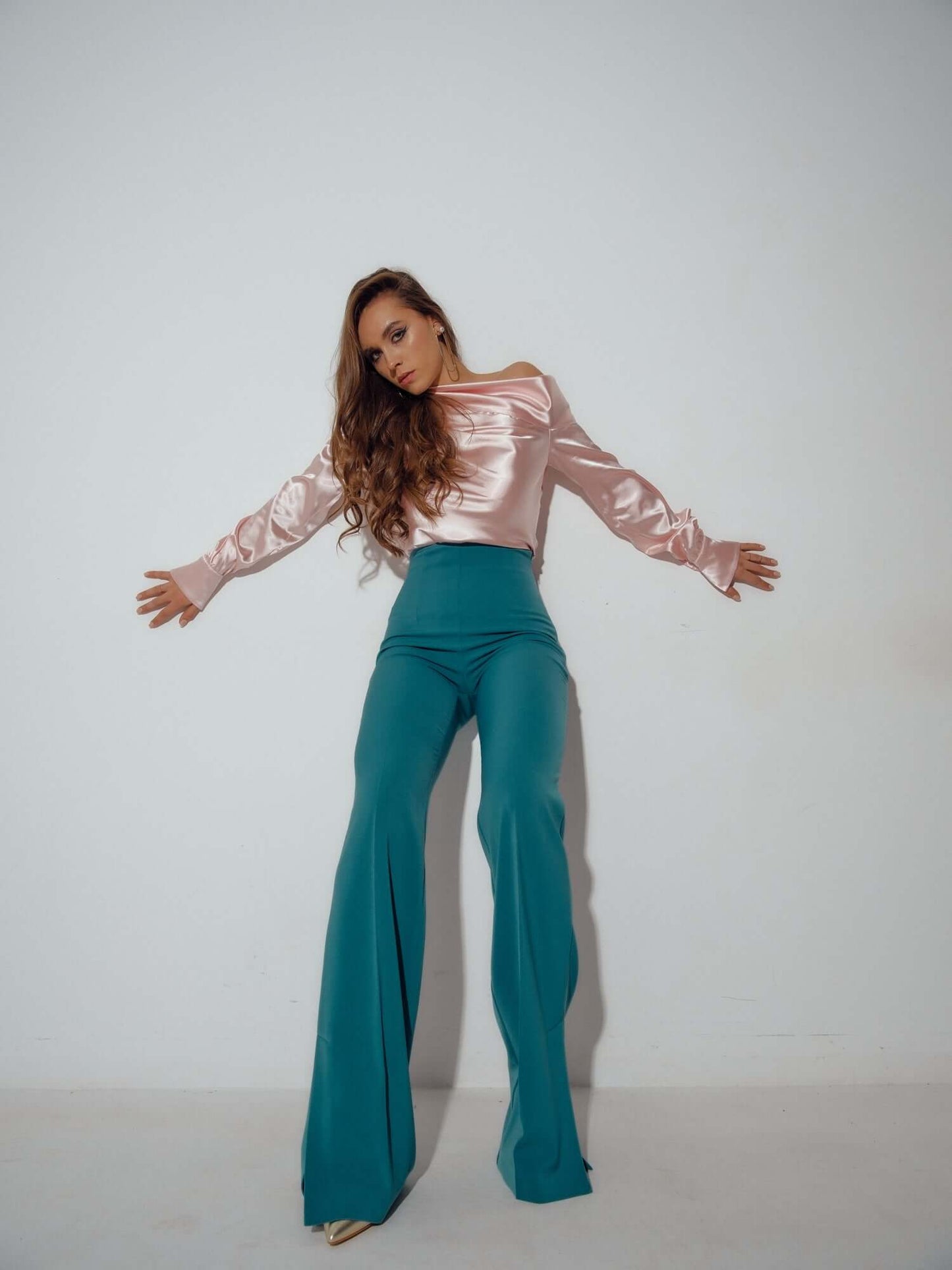 Tia Dorraine Magic Hour Wide-Leg Trousers Sharply tailored to inject ensembles with confidence, these pants reinterpret the classic palazzo pair with a polished edge and will fit perfectly in your capsule wardrobe. Expect a fusion of classic sophisticatio